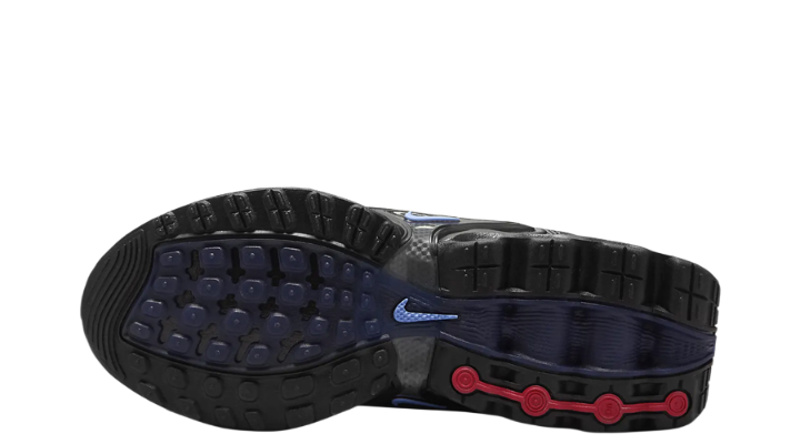 Kids' Nike Air Max DN outsole with deep tread, blue panel and red accents