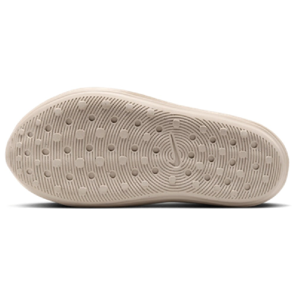 Men's Nike ReactX Rejuven8 LT clogs outsole, light brown textured traction tread