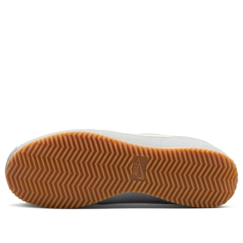 Women's Nike Cortez LT gum rubber outsole with zigzag tread, smoke gray upper.