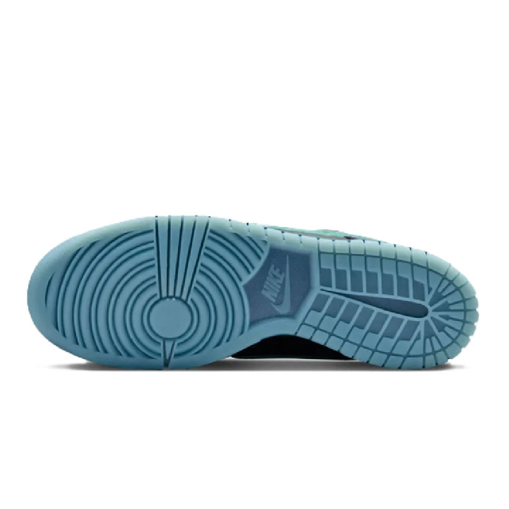 Nike low-top sneaker outsole in blue with traction pattern and herringbone grooves.