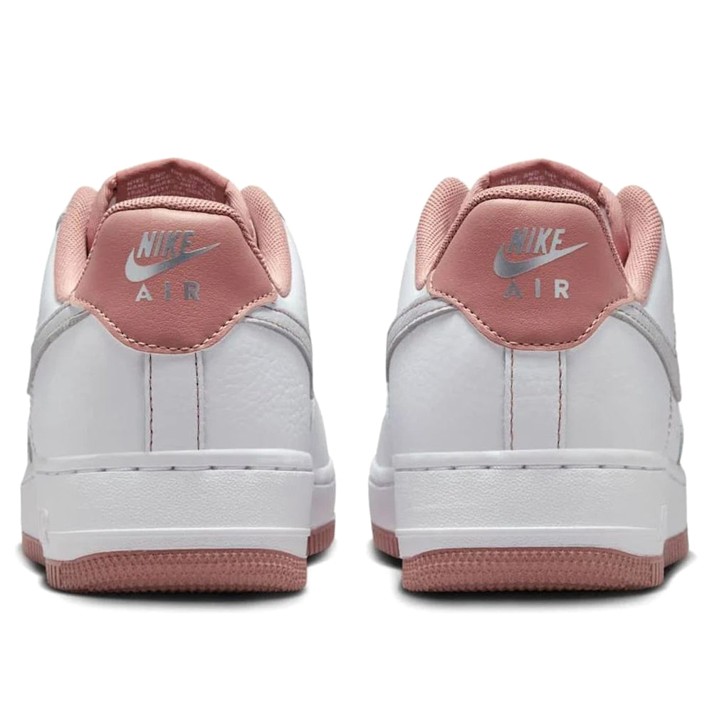 Nike Air Force 1 sneakers, rear view with pink heel tab and brown rubber outsole