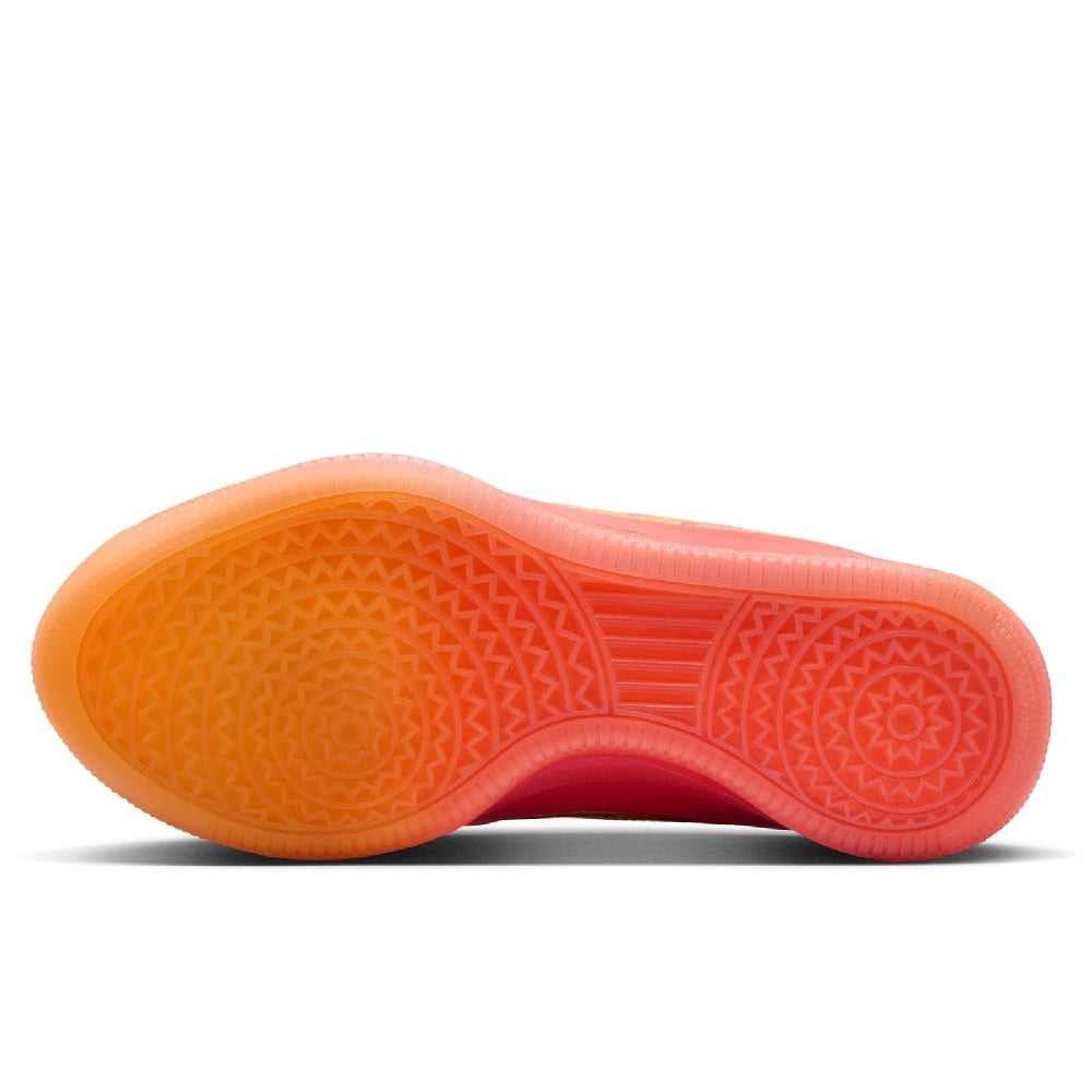 Nike rubber outsole with textured traction pattern in coral-orange and pink
