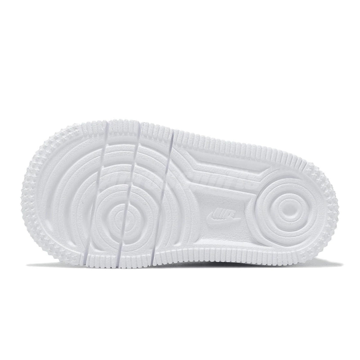 White rubber outsole with circular traction tread and Nike logo