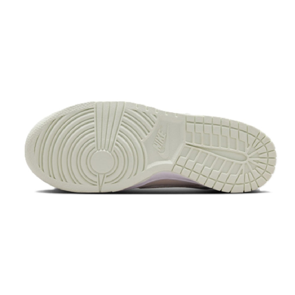 Big Kid's Nike Dunk Low suede sneakers outsole view, light rubber tread and traction grooves
