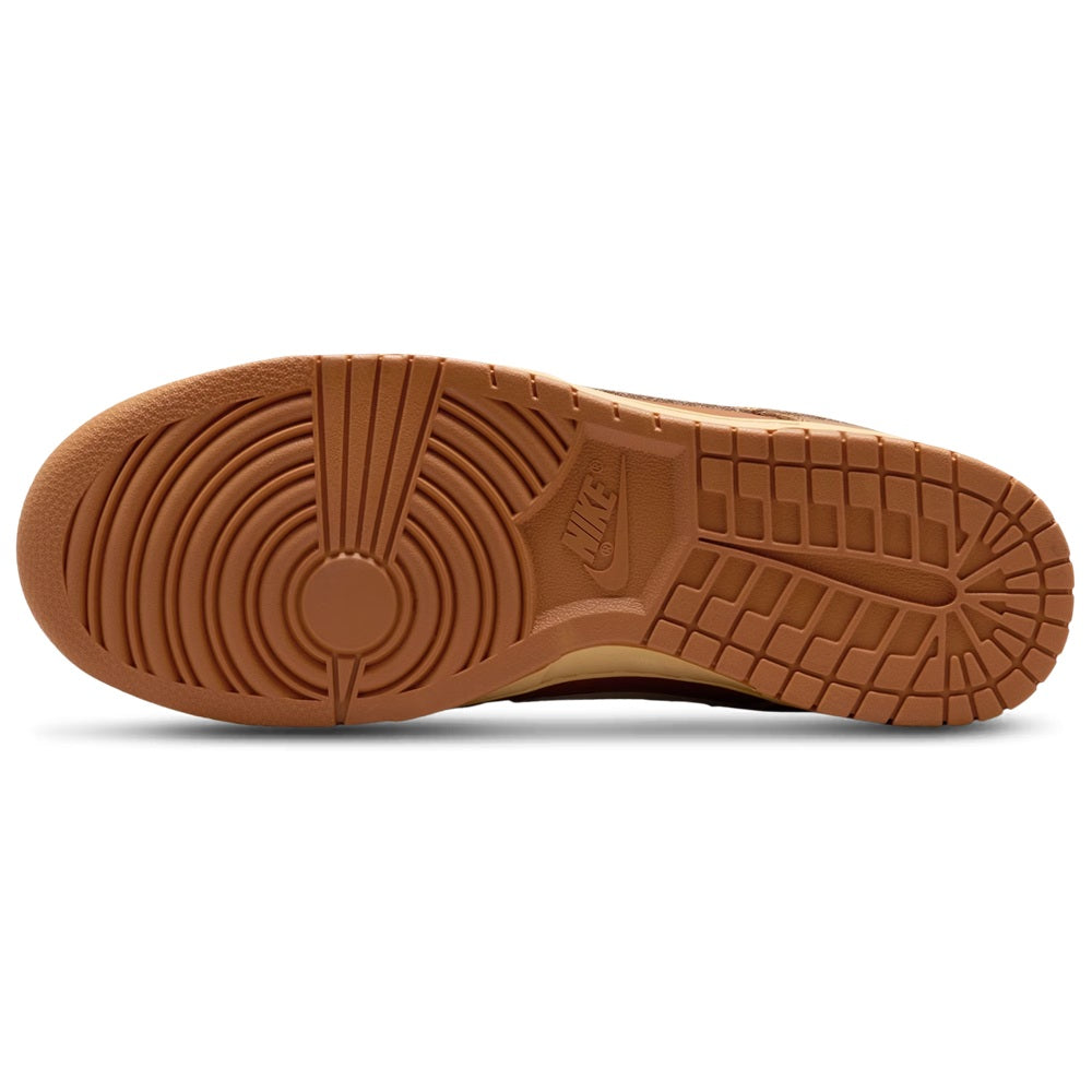 Nike Dunk Low sneaker outsole with textured rubber tread in tan/brown