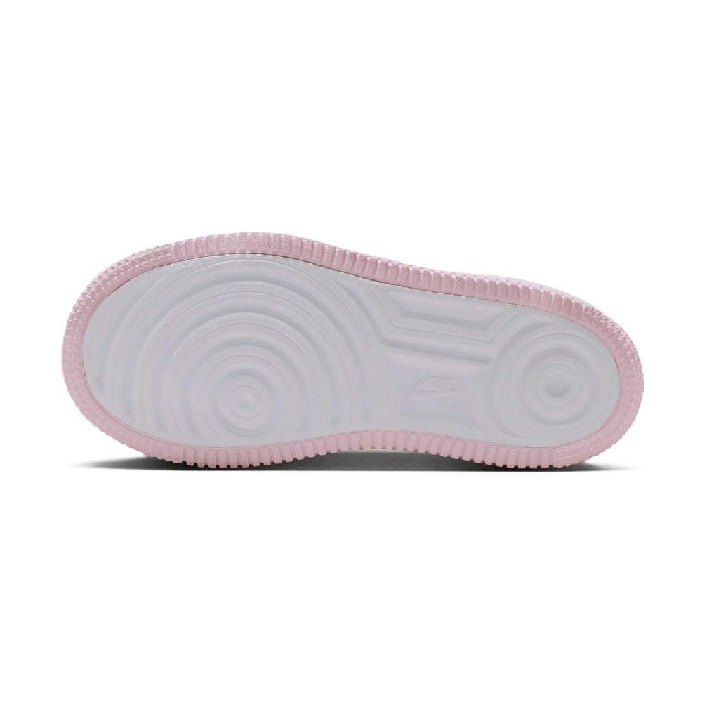 Kids low-top sneaker outsole with pink edge and light gray tread pattern