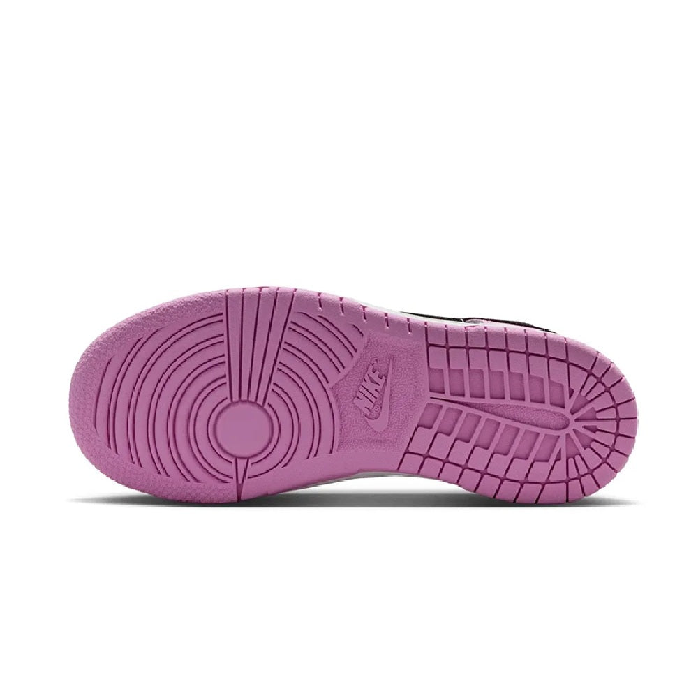 Kids low-top sneaker outsole with pink rubber tread pattern