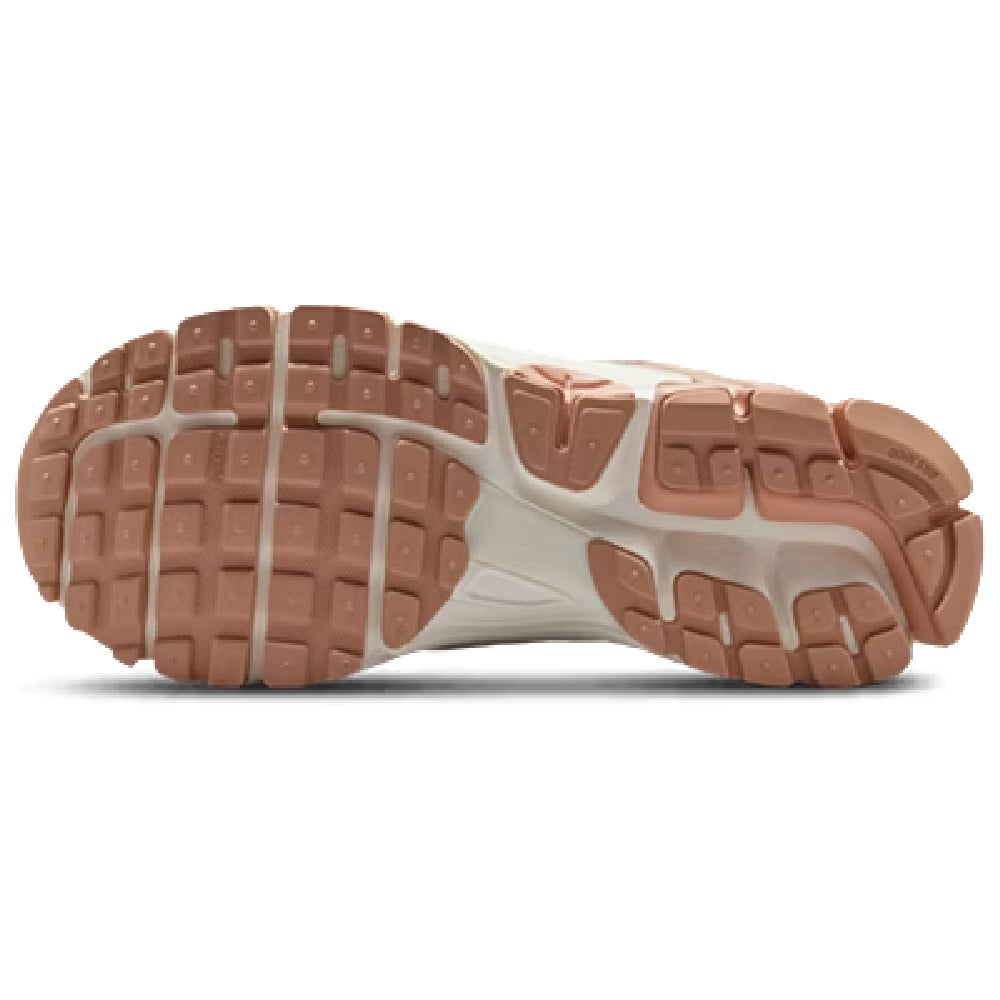 Women’s Nike Zoom Vomero 5 rubber outsole with patterned tread, rose-gold and white