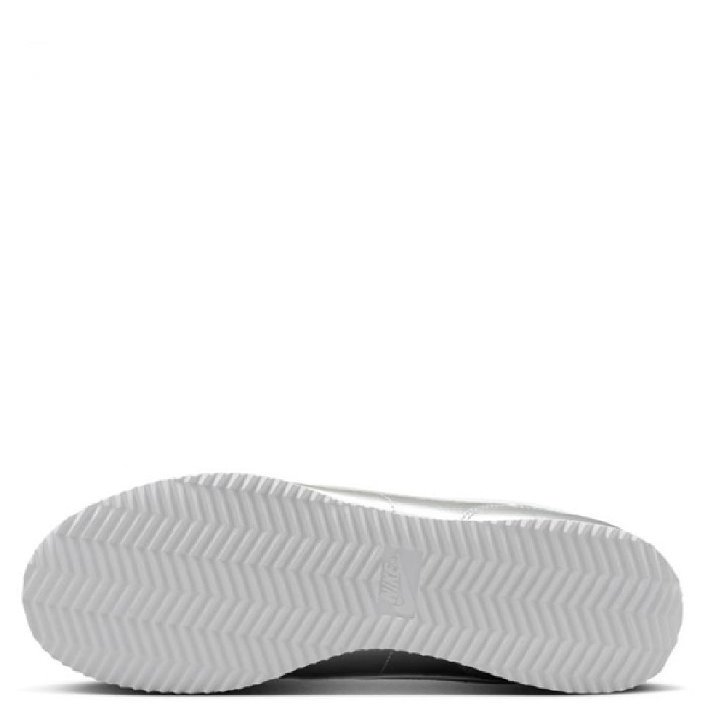 White Nike Cortez rubber outsole with zigzag tread on underside.