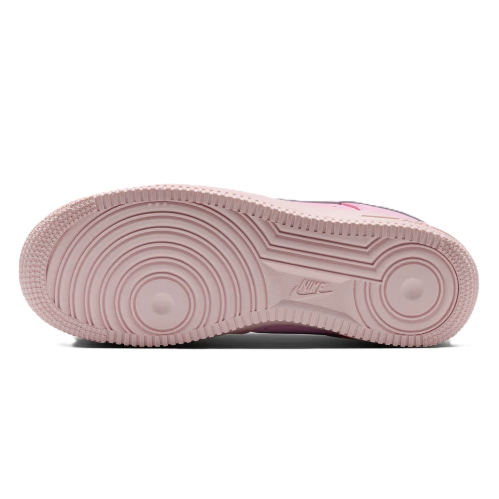 Pink rubber outsole with circular tread pattern for low-top sneakers