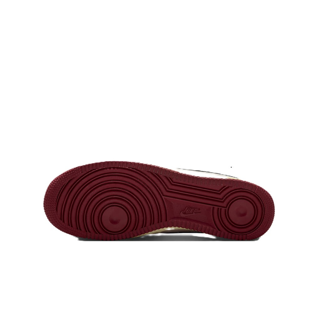Burgundy rubber outsole for low-top sneakers with circular traction pattern