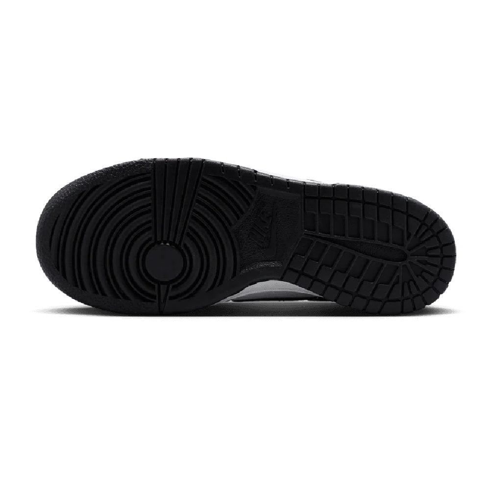 Kids' Nike Dunk Low sneakers outsole, black rubber tread with circular pivot pattern