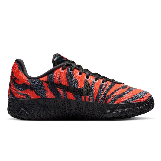 Kids' Nike Ja 3 sneakers with orange and black animal print and black rubber sole