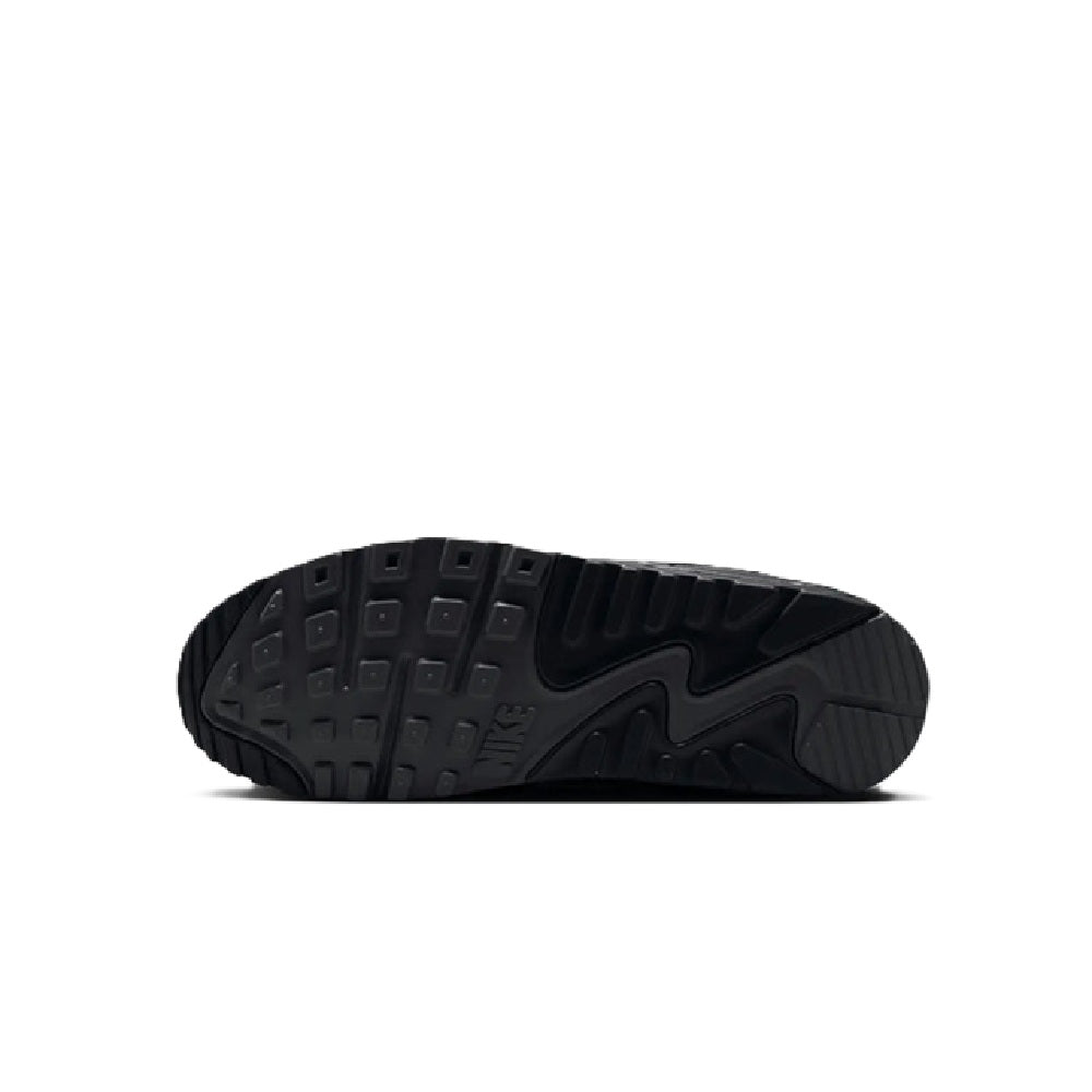 Black sneaker outsole with tread pattern and Nike logo detail