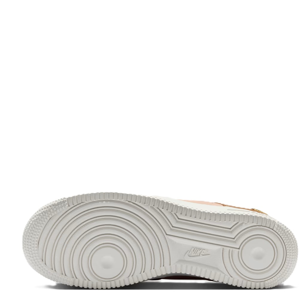 White rubber outsole with circular traction pattern under low-top sneaker