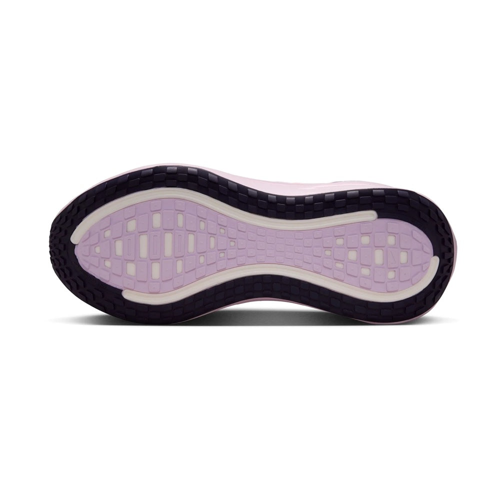 Women's Nike Vomero Plus running shoe outsole, dark traction tread with light lilac edges.