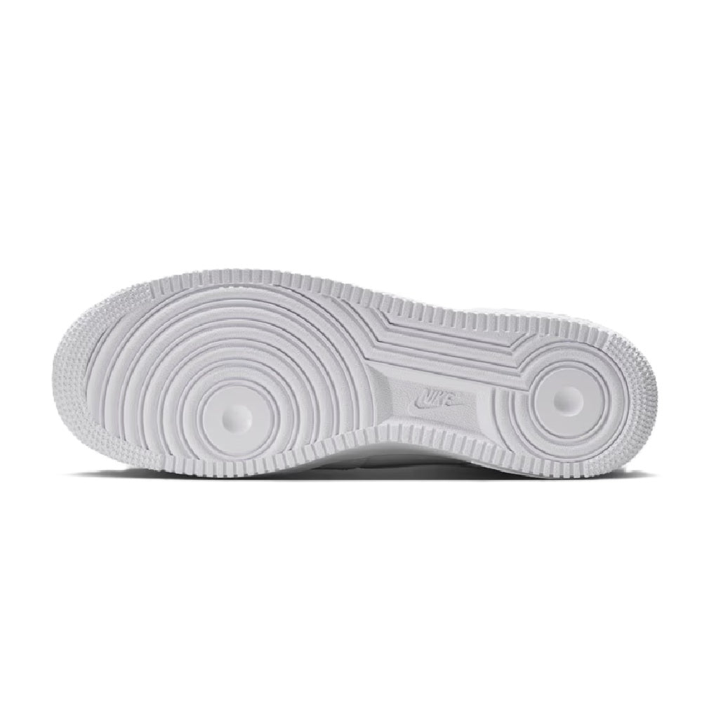 Nike Air Force 1 rubber outsole, light gray with circular traction pattern.