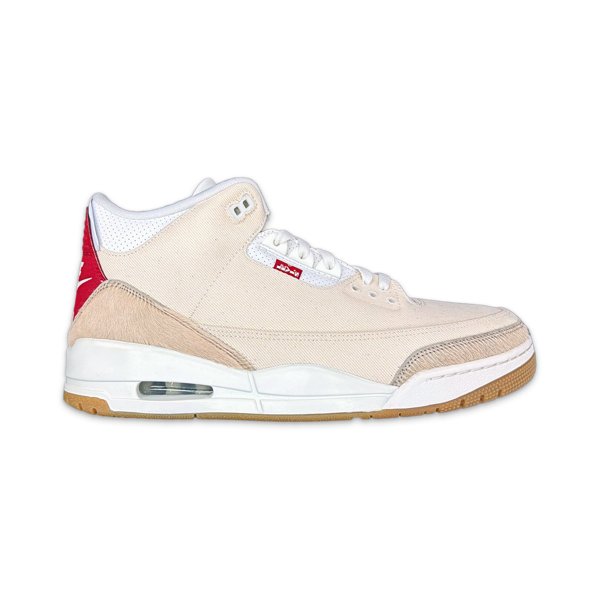 Air Jordan 3 Retro low-top sneakers with cream upper, red heel panel, visible Air unit