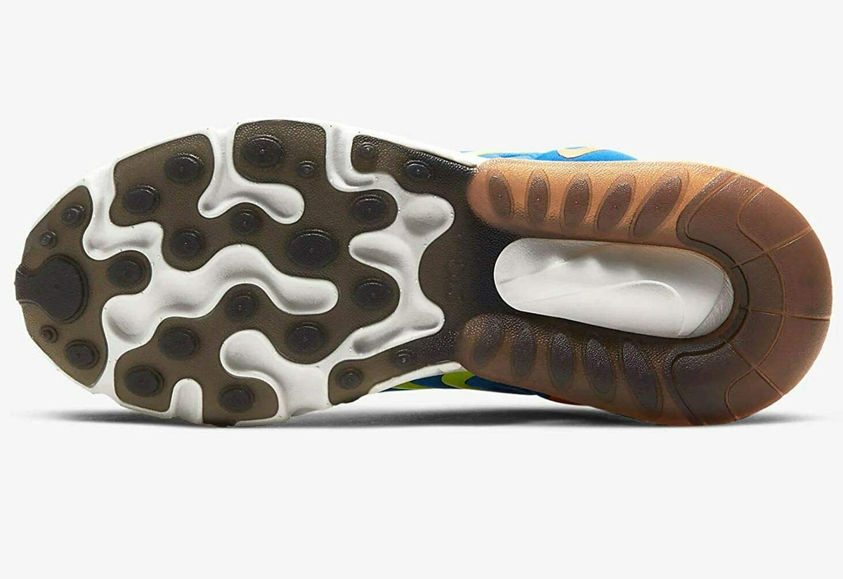 Nike sneaker outsole, white tread pods with brown rubber heel and amber air window