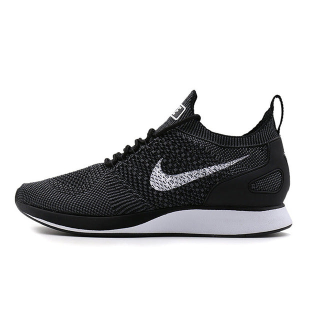 Black knit running sneaker with silver Nike swoosh and cushioned collar
