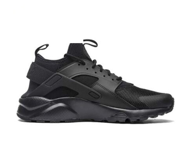 Black running shoes with dark gray cage and textured upper, lace-up style