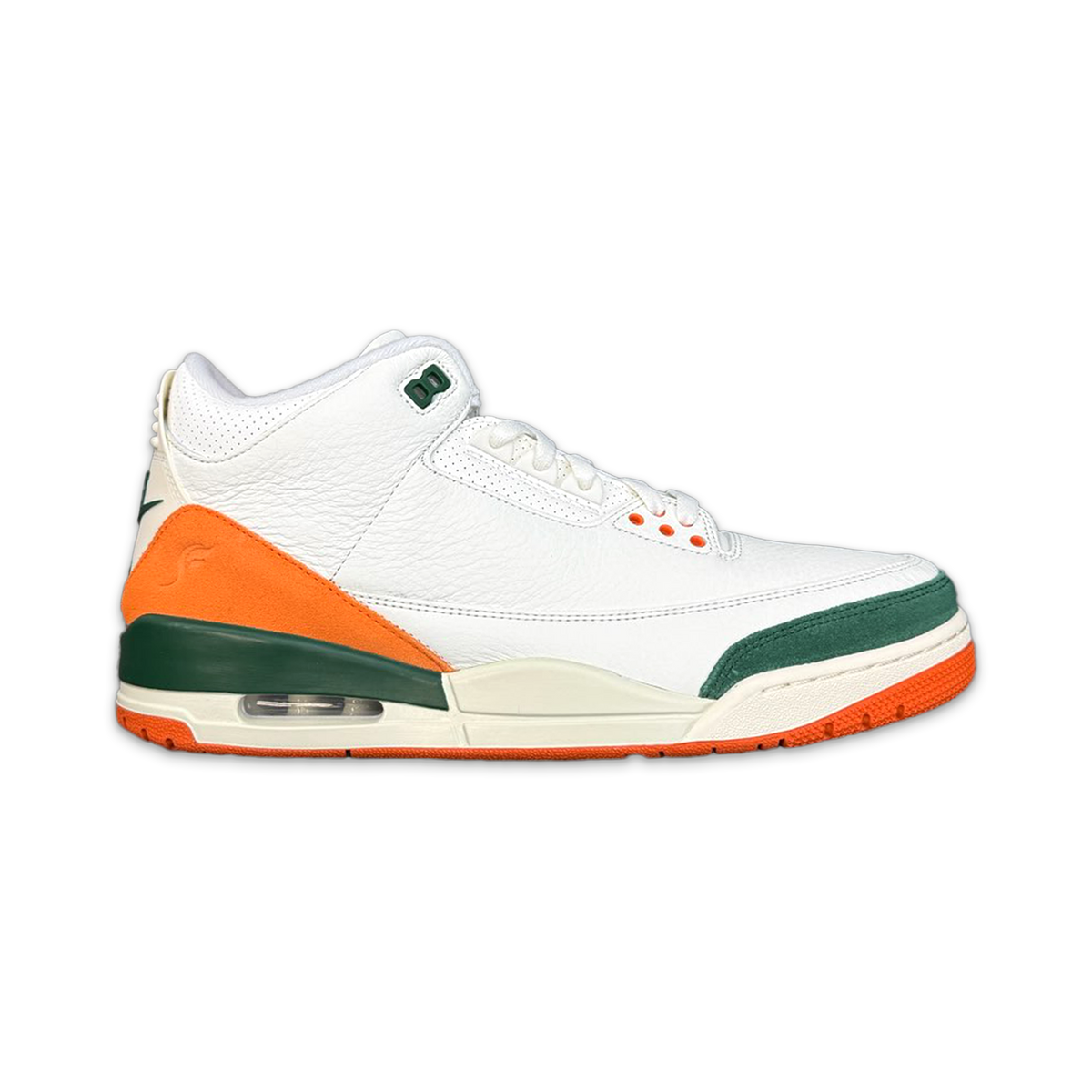 Air Jordan 3 Retro SP white leather sneaker with orange heel and green accents