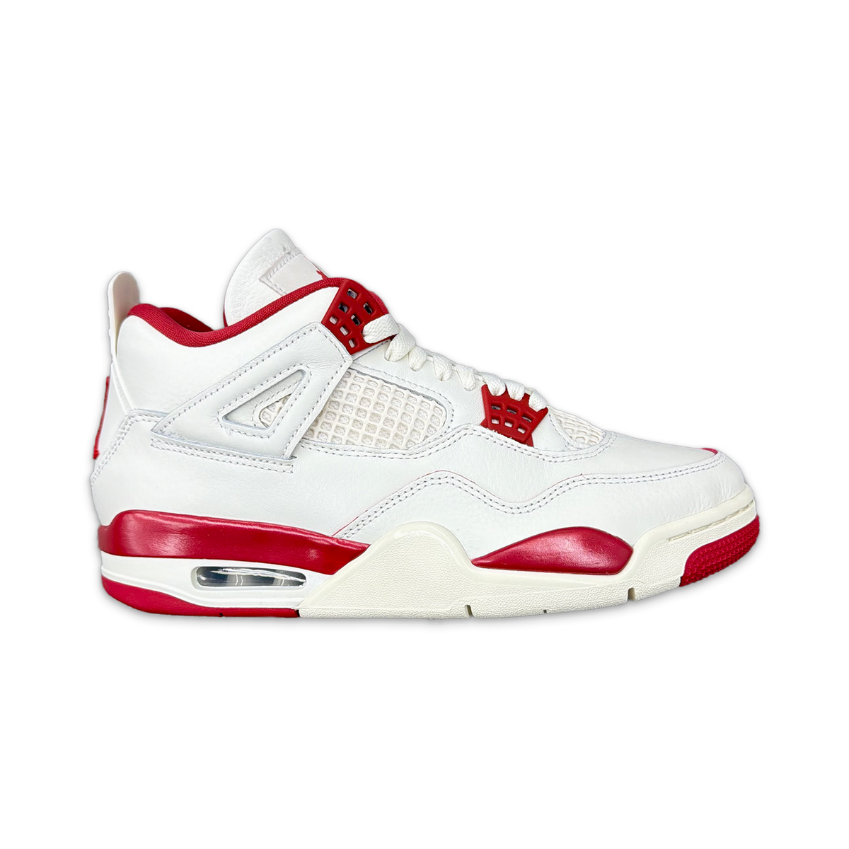 Women's Air Jordan 4 Retro sneaker in white with red accents and mesh panels