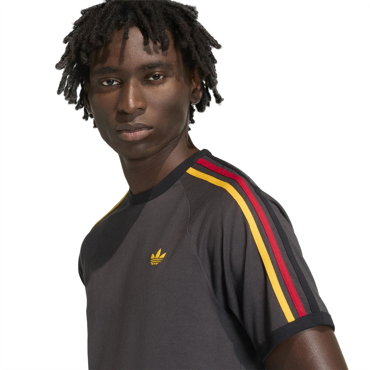 adidas Originals men's black T-shirt with gold trefoil logo and striped sleeve