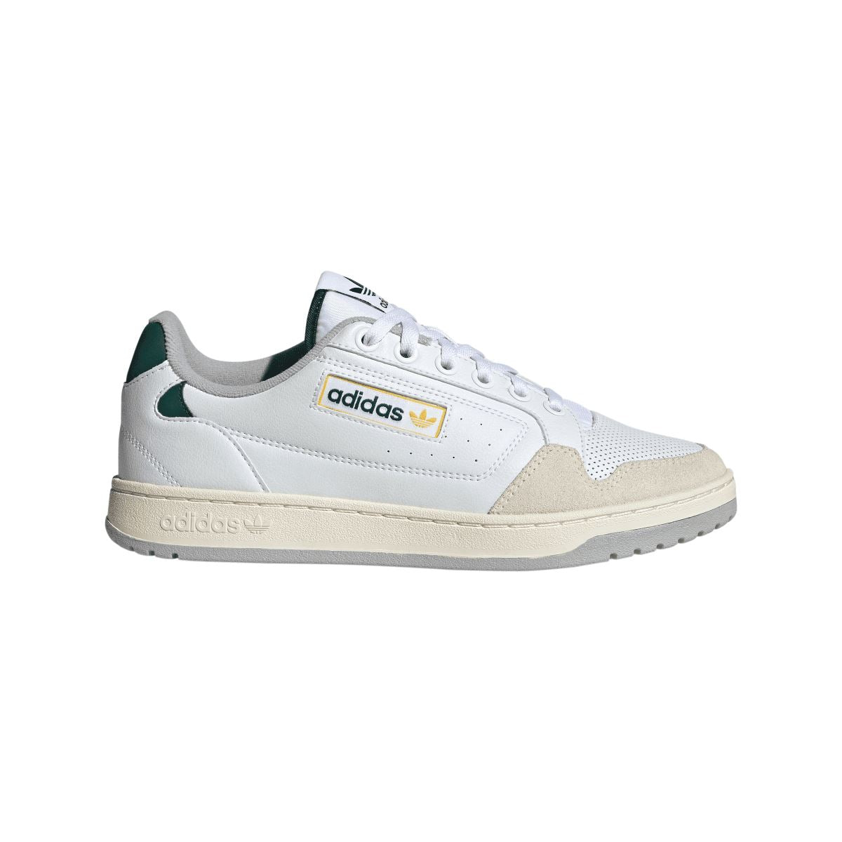 White adidas NY 90 low-top trainers with green suede accents and lace-up front