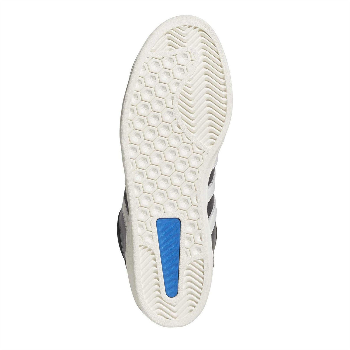 White outsole with hex tread and blue logo on black sneakers