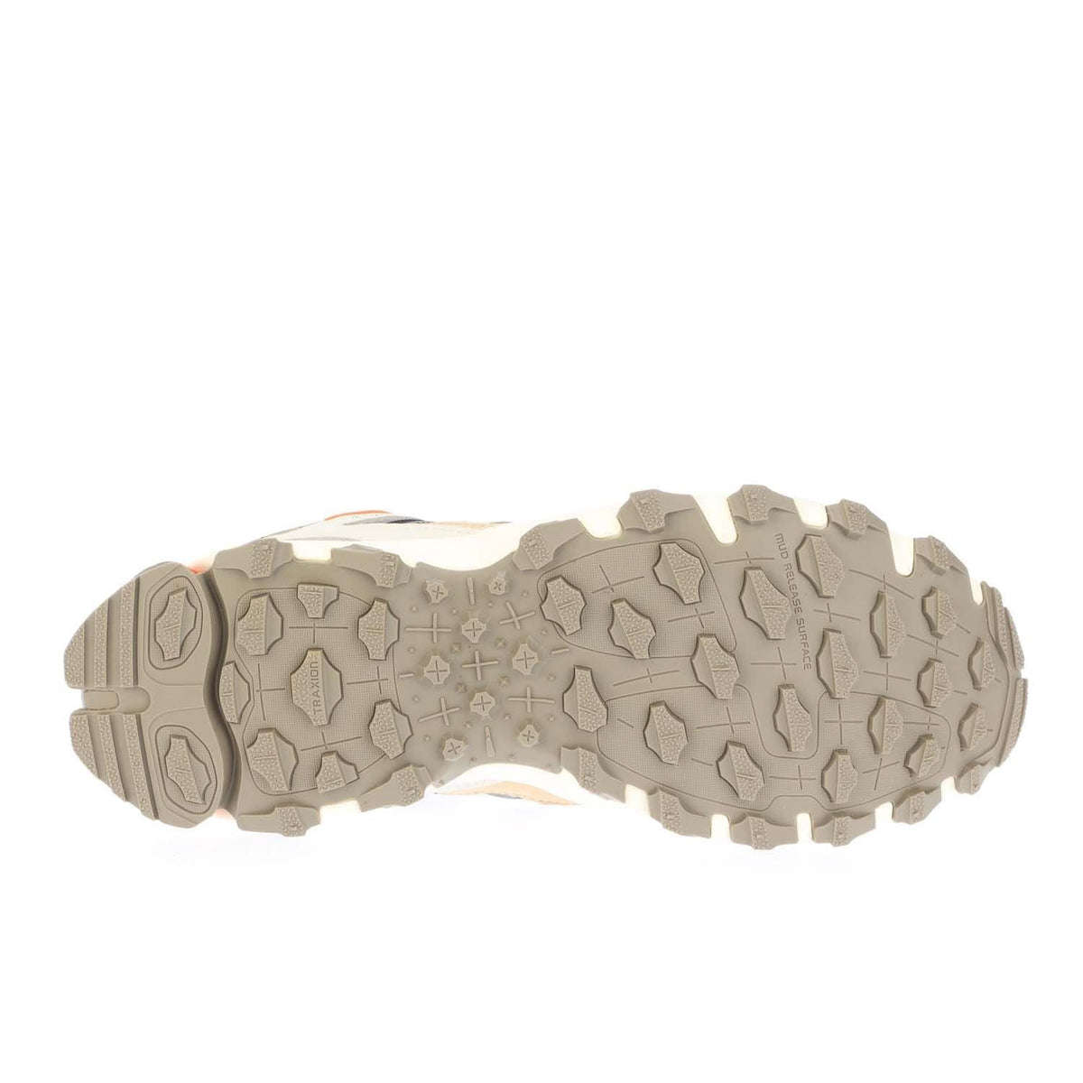 Rubber outsole with rugged tread and zigzag traction for trainers