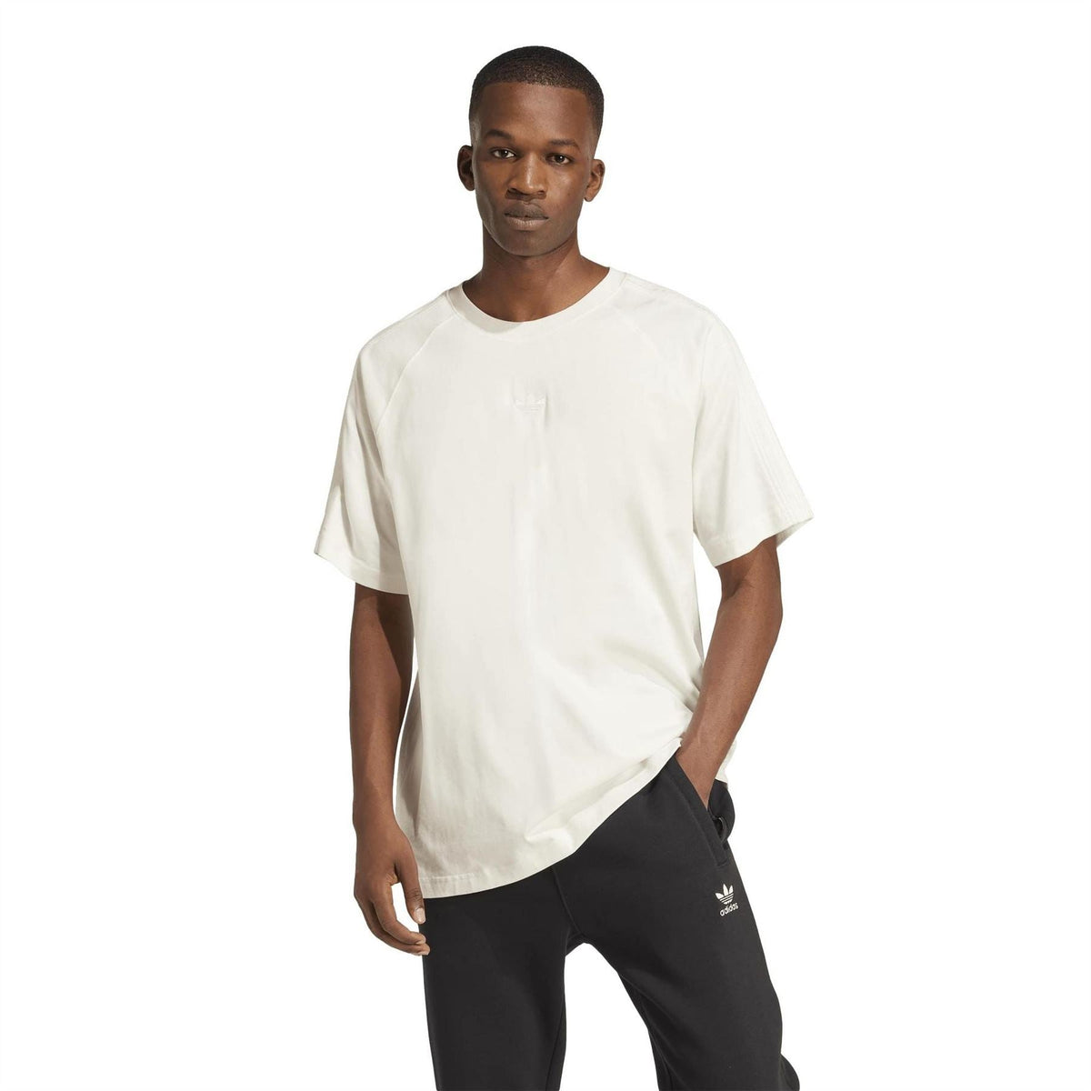Cloud white crew-neck T-shirt on model, short sleeves and small chest logo