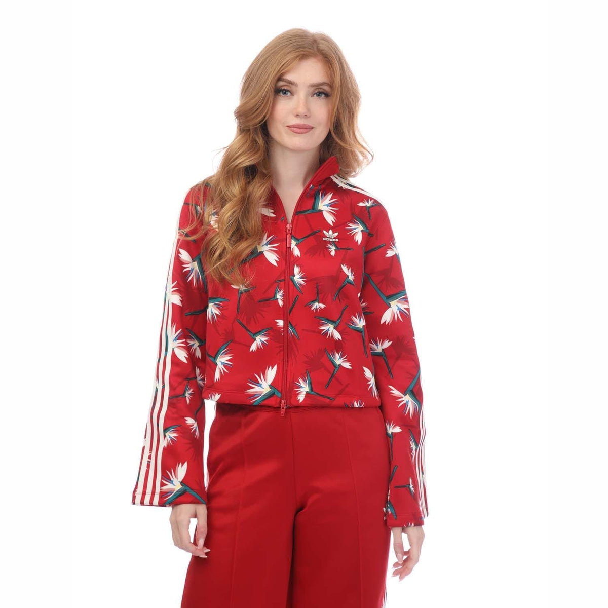 Red floral track jacket with full zip, stand collar, and white stripe sleeves