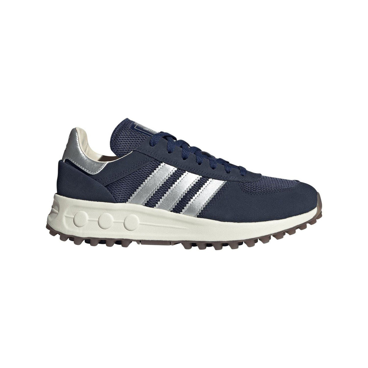 Navy and white low-top trainer with lace-up closure and rubber traction sole