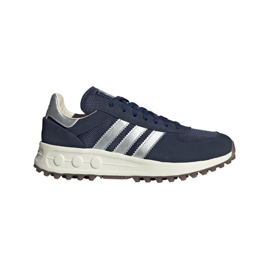Navy and white low-top trainer with lace-up closure and rubber traction sole