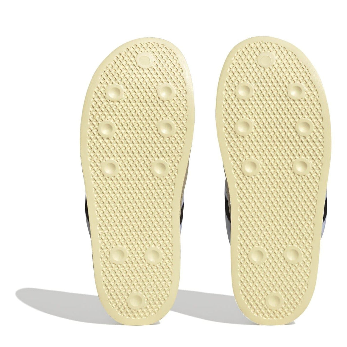 adidas Originals Puffy Spr Trainers with three stripes, stylish footwear featuring a puffy design and comfortable sole.
