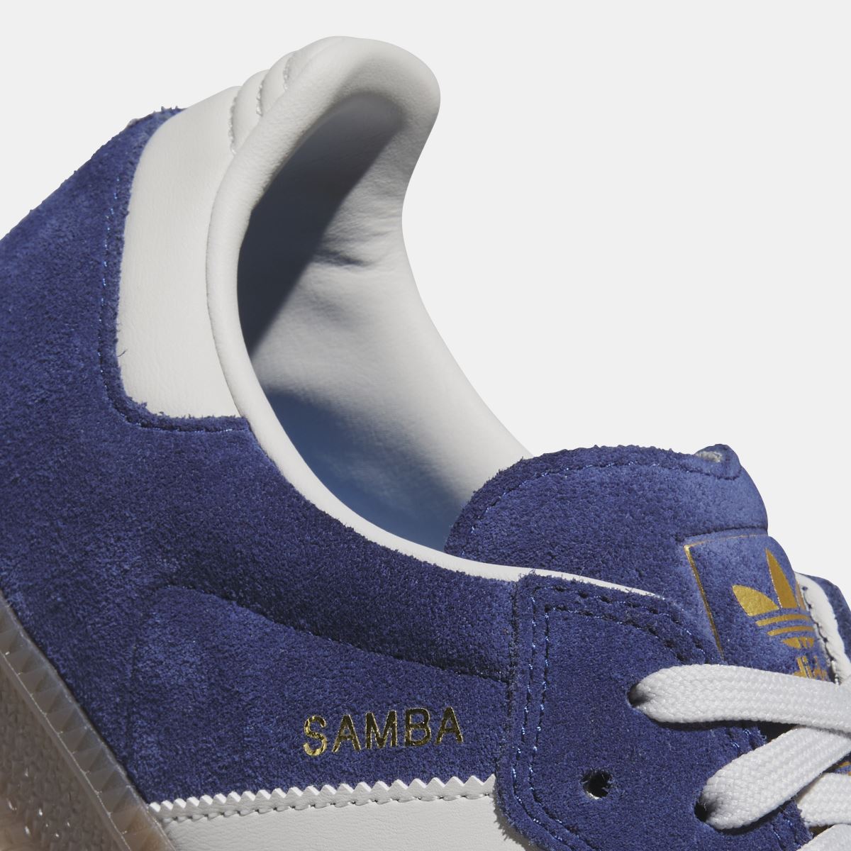 adidas Originals Samba ADV shoes in white with black accents, showcasing classic sneakers with leather and suede details