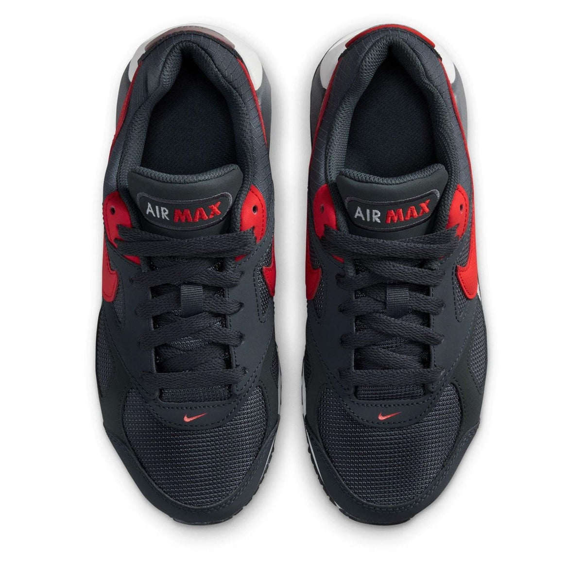 Kids Nike Air Max Ivo sneakers, black with red heel accents and Air Max logo on tongue