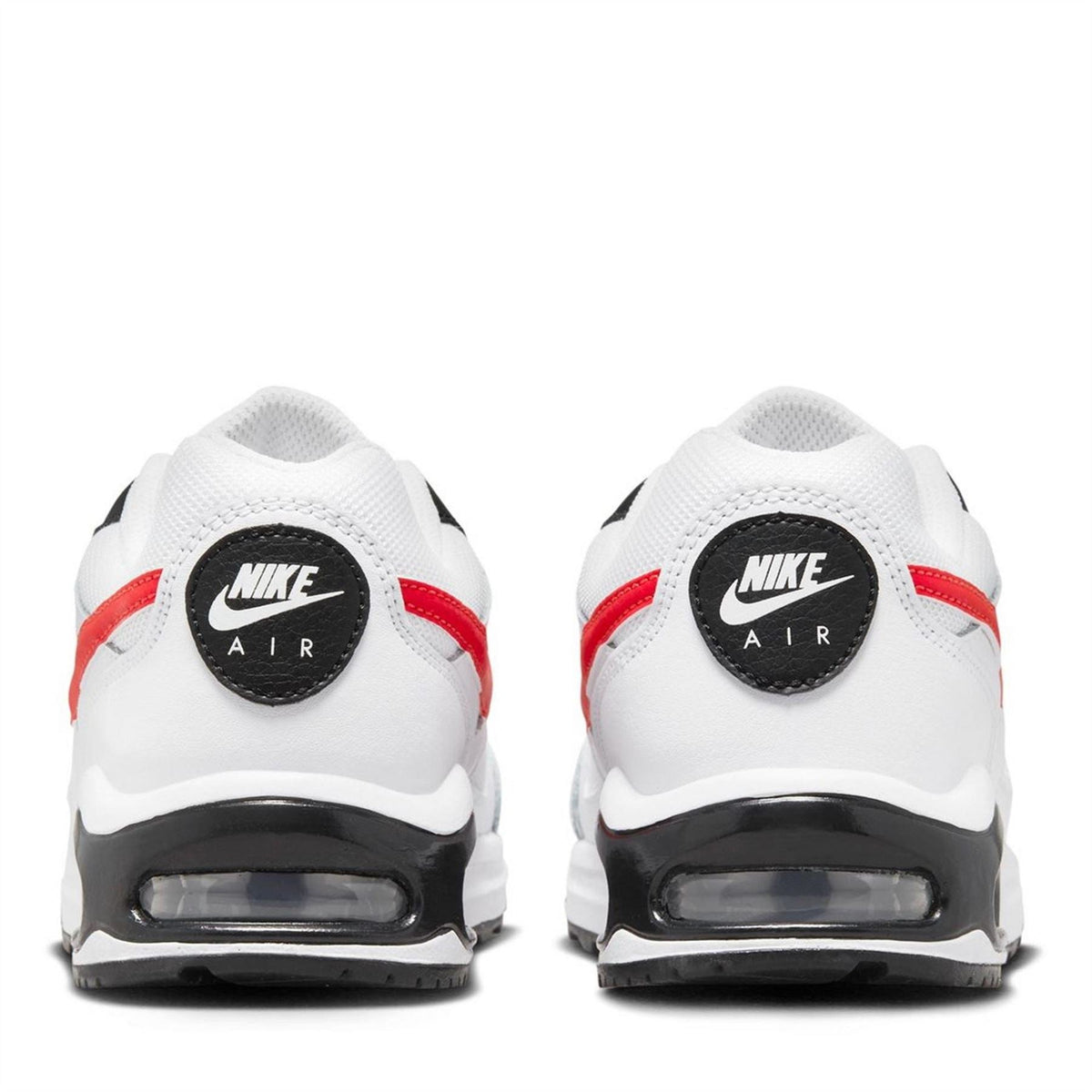 White heel view with AIR badge, black outsole, and red side details
