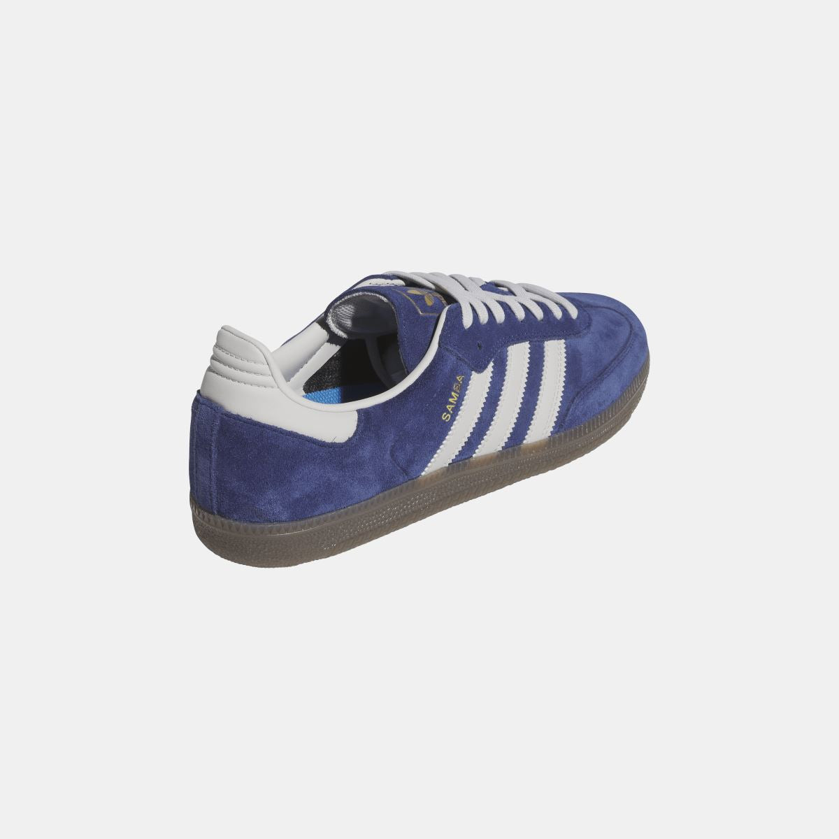 Black adidas Originals Samba ADV shoes with white stripes and gum sole, showcasing classic sneaker design.