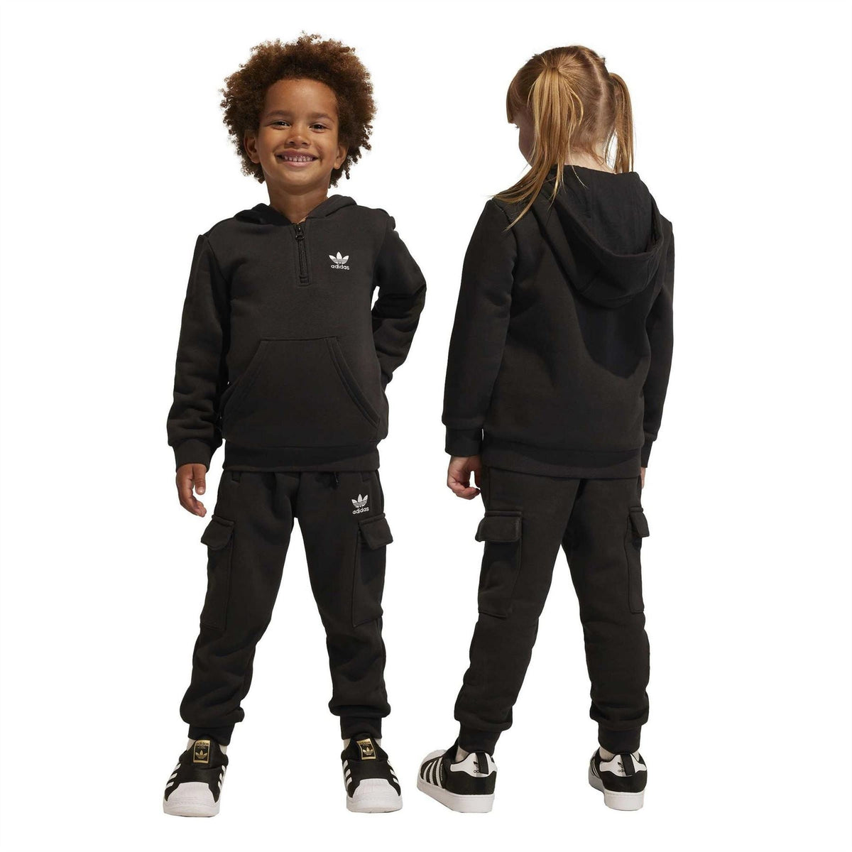 adidas Originals zip hoodie and cargo pants tracksuit set, navy color, with zip-up hoodie and matching cargo pants, casual athletic style