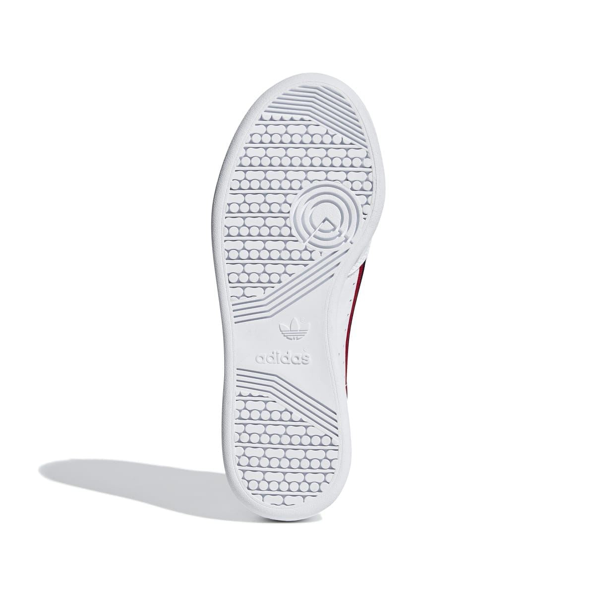 White Continental 80 junior sneaker outsole with patterned traction and circular logo.