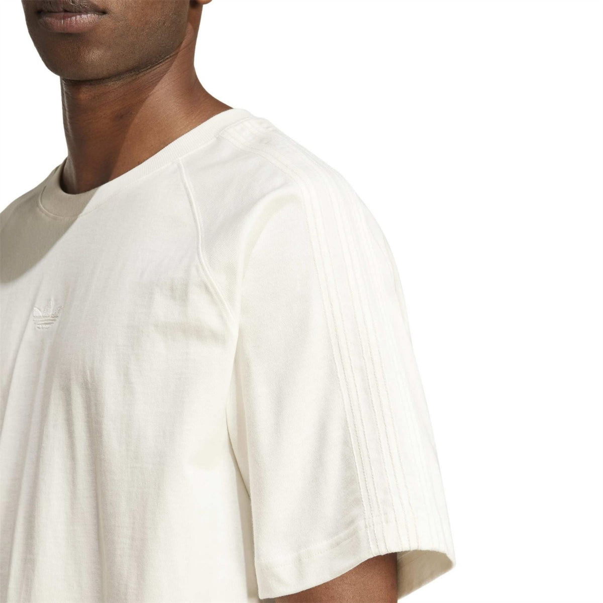 Cloud white T-shirt side view with short sleeves and small chest logo detail