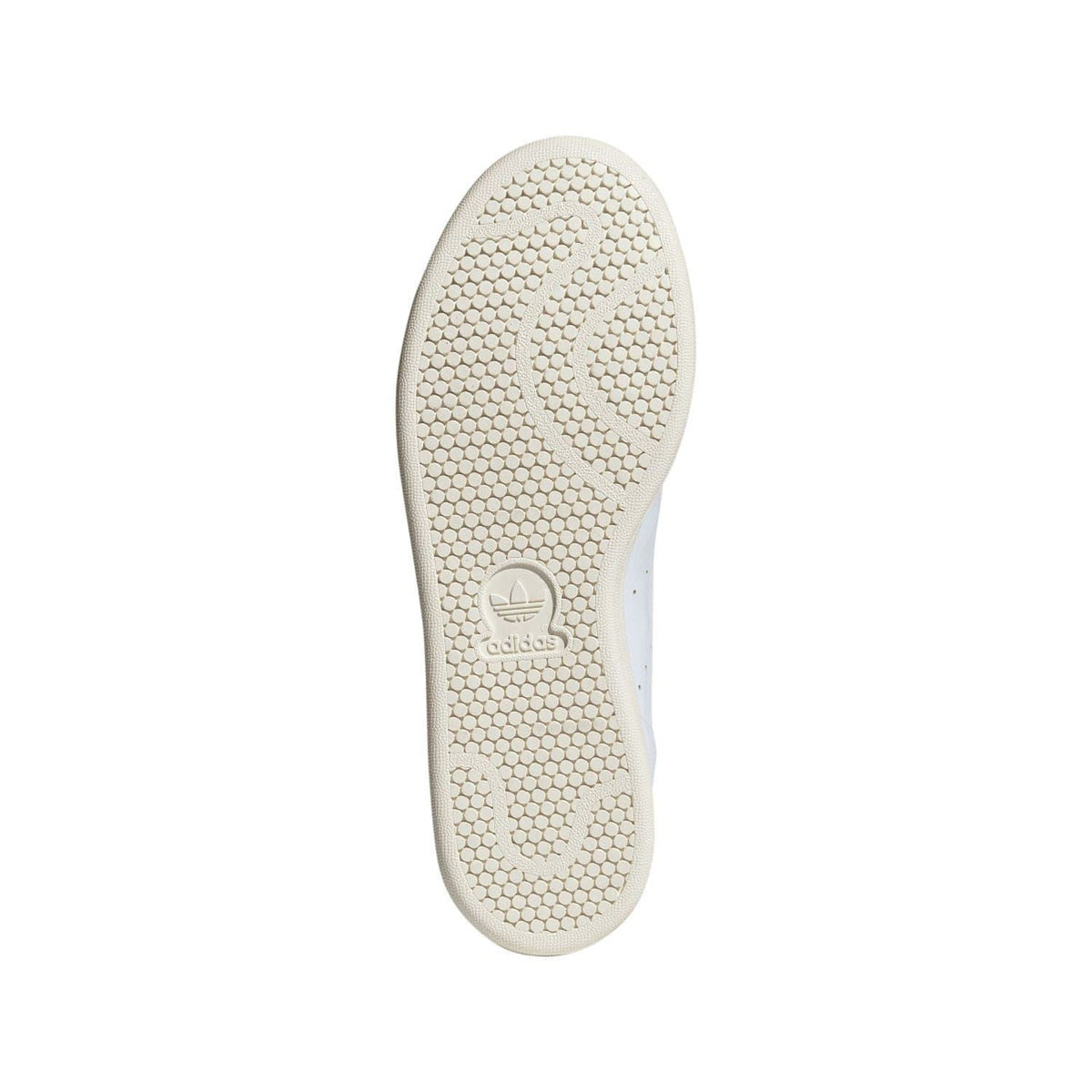 White rubber outsole with textured grip pattern and adidas logo