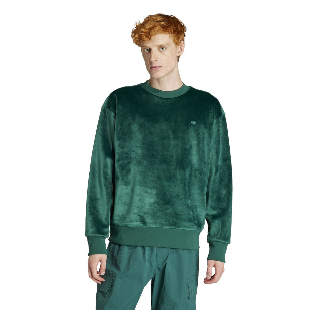 Green relaxed-fit sweater with crew neck, roomy shoulders, and ribbed cuffs
