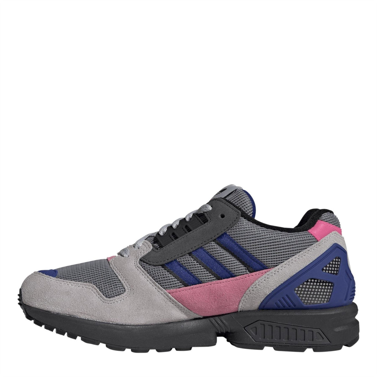 Low-top sneakers with grey suede panels, blue heel trim, pink midsection, lace-up