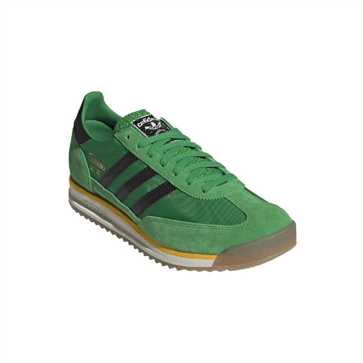 Green adidas trainers, three-quarter side view with orange trim and lace-up