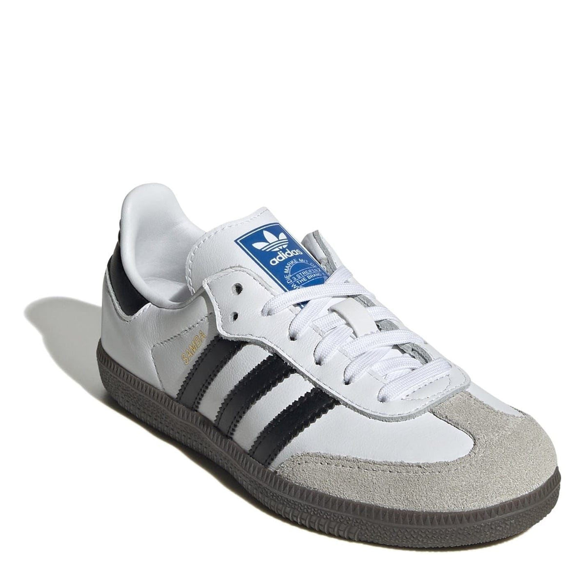 adidas Originals Samba low-top sneaker with white upper, black stripes, and blue tongue label