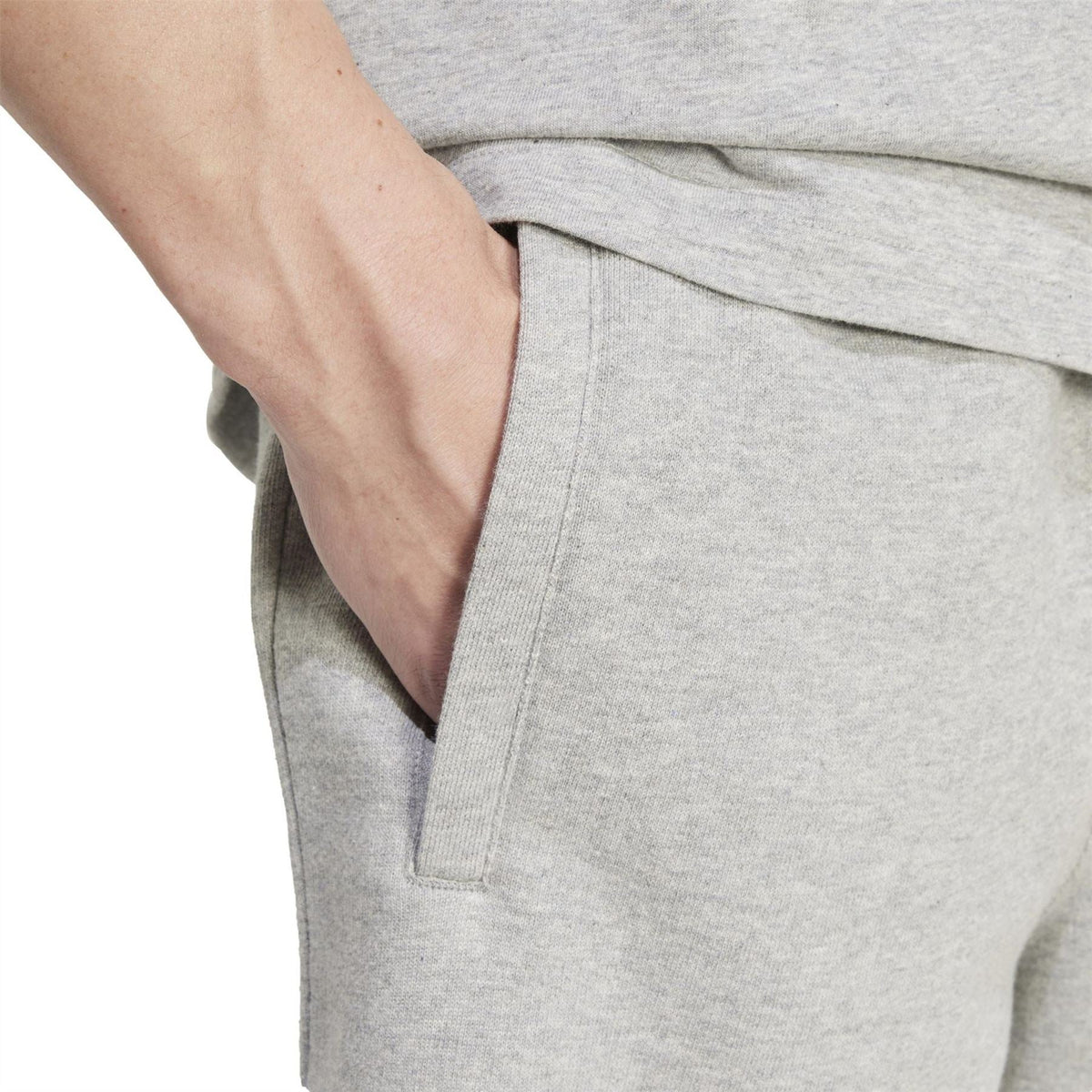 adidas Originals Ess shorts in medium grey heather, elastic waistband and side seams