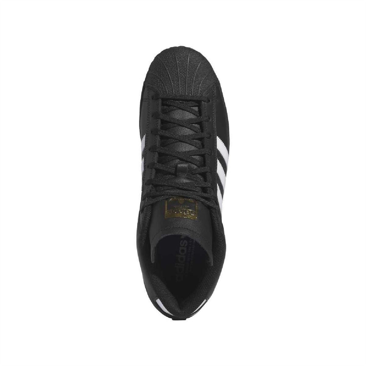 Black mid-top sneaker top view with lace-up closure and gold tongue label